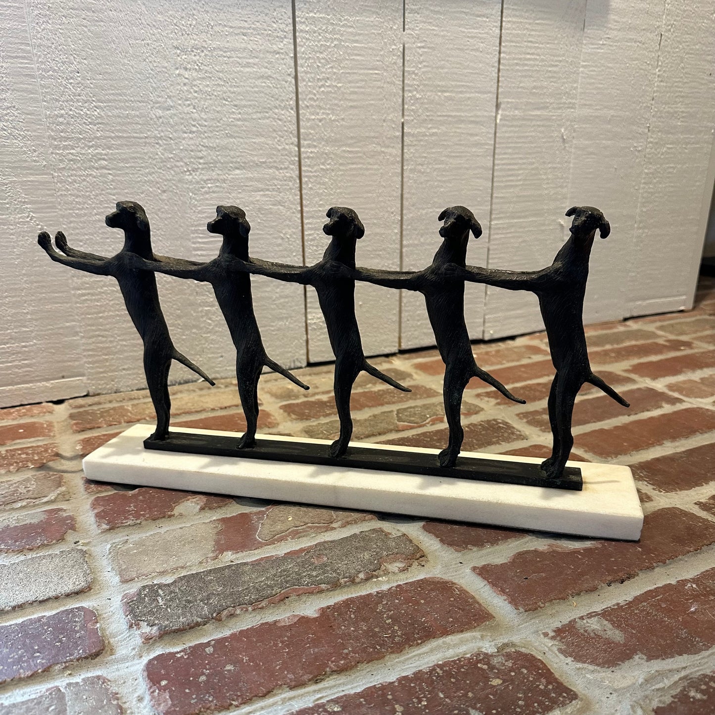 Conga Line Dog Sculpture